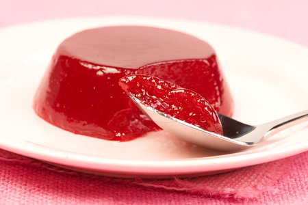 The old favorite homemade jellied cranberry sauce on pink