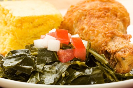 Fried Chicken served with collard greens and cornbreadの写真素材