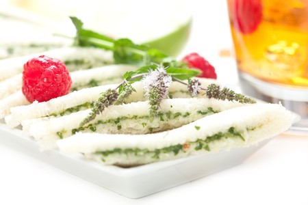 iced tea with mint apple tea sandwichesの写真素材