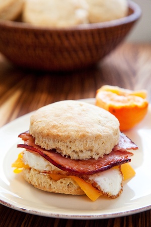 Ham, egg and cheese on a light fluffy biscuitの写真素材