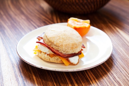 Ham, egg and cheese on a light fluffy biscuitの写真素材