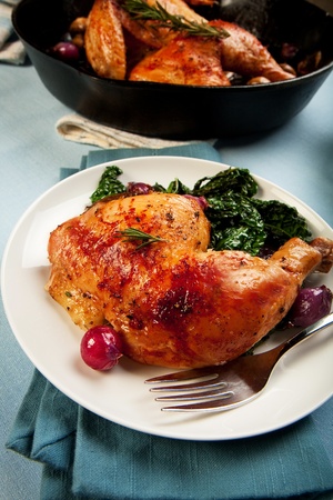 Chicken leg quarter with black tuscan kaleの写真素材