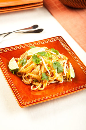 Tasty Pad Thai on a square plateの写真素材
