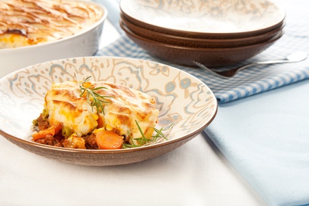 Crisp mashed potatoes top ground meat and vegetablesの写真素材