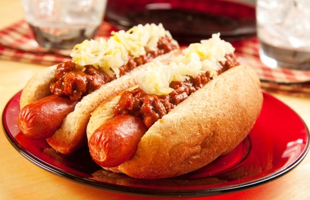 Perfect for the big game,  picnic, party or anytime, chili dogs with sauerkraut.の写真素材