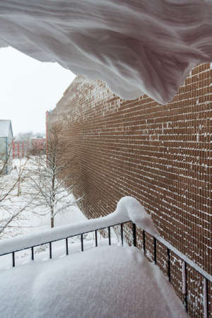 Balcony view after a night of heavy snowfallの写真素材