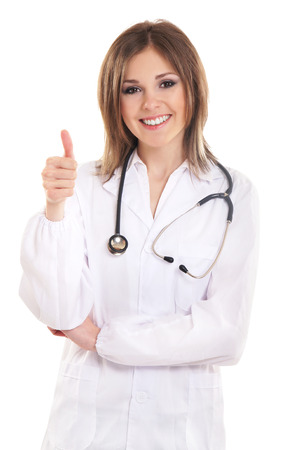 Young attractive female doctor isolated on whiteの写真素材