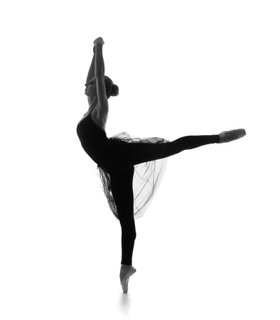 Black and white trace of young beautiful ballet dancer isolated over white backgroundの写真素材