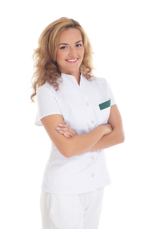 Young attractive female doctor isolated over white backgroundの写真素材