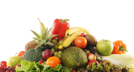 Pile of fresh and tasty fruits and vegetables isolated on whiteの写真素材