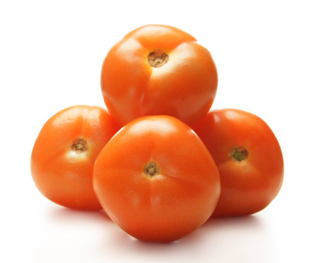 tomatos isolated on whiteの写真素材