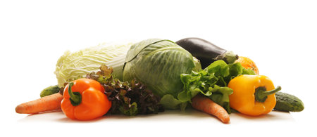 Pile of fresh and tasty fruits and vegetables isolated on whiteの写真素材