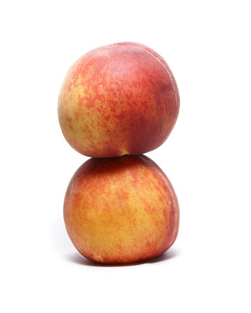 Sweet peach isolated on white backgroundの写真素材