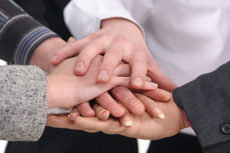 Group handshake with a lot of different hands