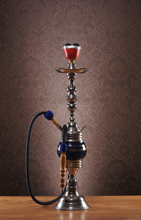 Exotic hookah with the fruit on the top over vintage backgroundの写真素材