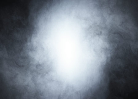 Smoke over black background