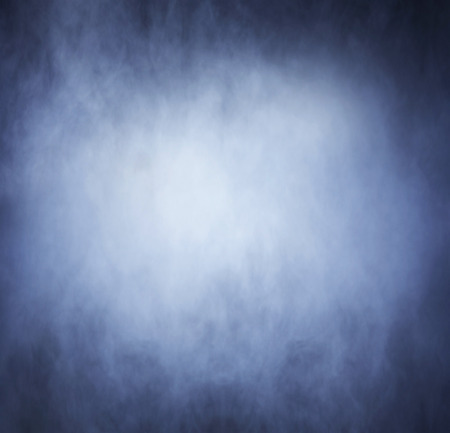 Abstract texture of the blue smoke over black backgroundの写真素材
