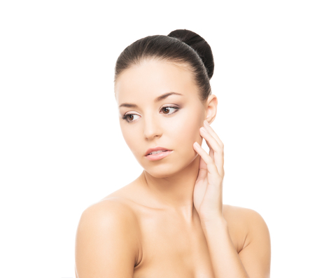 Beauty portrait of young, attractive and healthy brunette woman isolated on whiteの写真素材