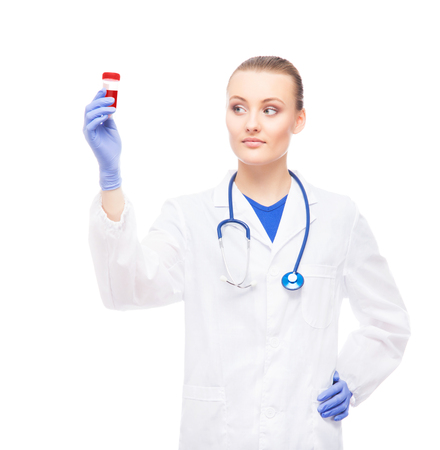 Young, professional and cheerful female doctor researching the blood analysis isolated on whiteの写真素材