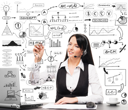 Call center service manager working in office. Businesswoman drawing conceptual schemes and diagrams isolated on white.の写真素材