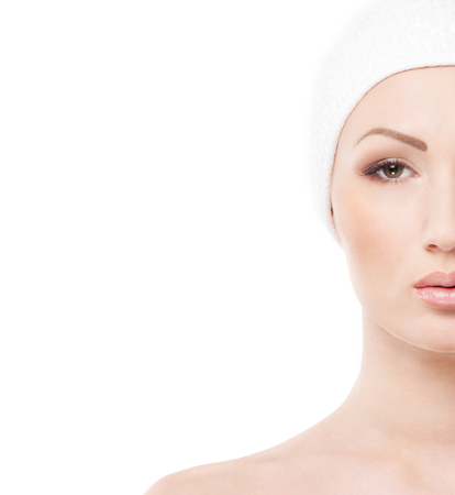 Spa portrait of young attractive woman isolated on whiteの写真素材