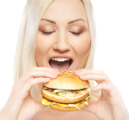 Young attractive woman with the hamburgerの写真素材