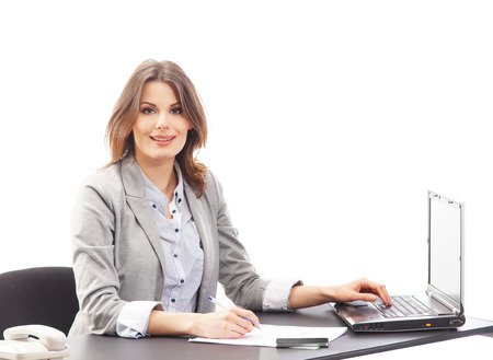 Business woman in office isolated on whiteの写真素材