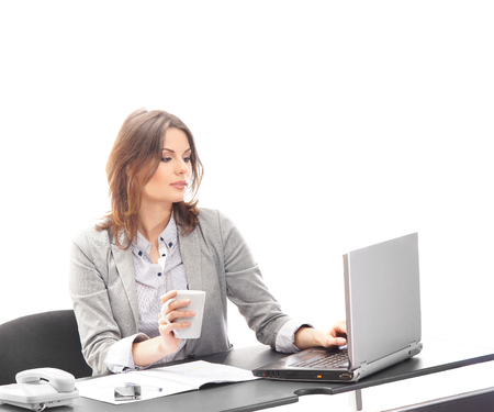 Business woman in office isolated on whiteの写真素材