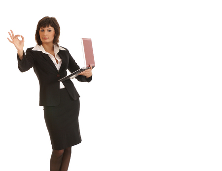 Attractive businesswoman with notebook isolated on whiteの写真素材