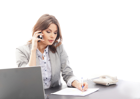 Business woman in office isolated on whiteの写真素材