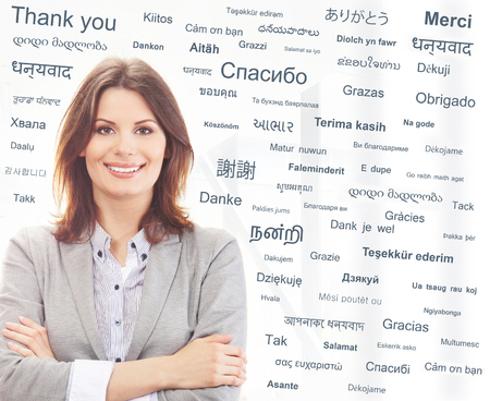 Business woman or teacher in office. Different world languages concept.の写真素材