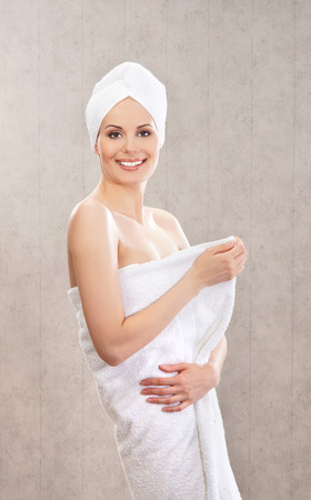 Young attractive woman in towelの写真素材