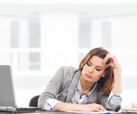 Business woman working in office on whiteの写真素材