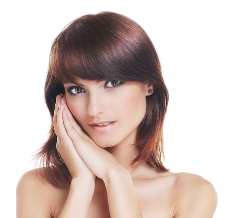 Portrait of young and healthy brunette isolated on whiteの写真素材