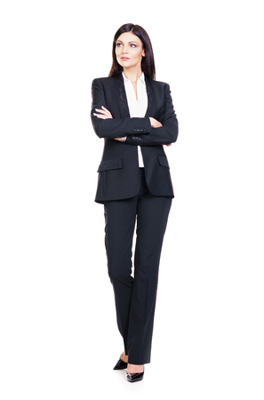 Young, confident, successful and beautiful business woman isolated on white. Occupation, career, job concept.の写真素材