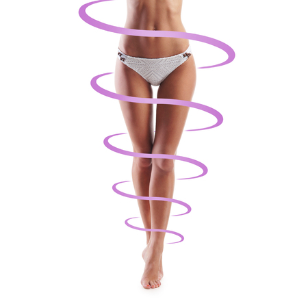 Close-up of thin and beautiful female body isolated on white. Weight loss, fat burn, sports, exercising concept.の写真素材