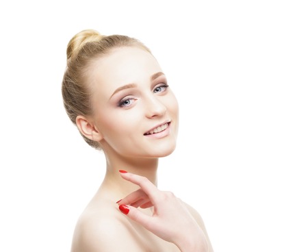 Beauty close-up portrait of baeautiful, fresh and healthy girl. Human face isolated on white.の写真素材