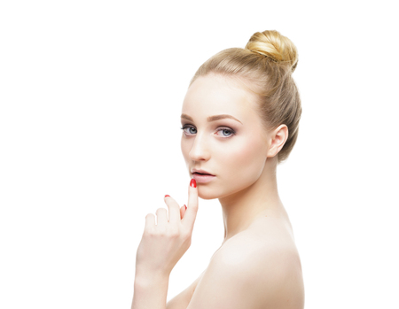 Beauty close-up portrait of baeautiful, fresh and healthy girl. Human face isolated on white.の写真素材