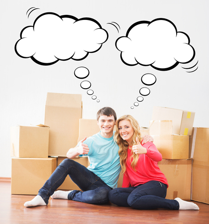 Attractive couple with thumbs up over background with boxes. Comics concept.の写真素材