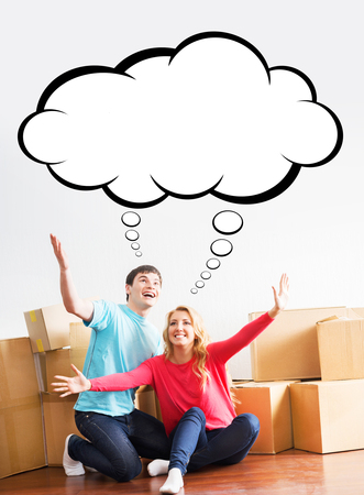Young, lovely couple being really happy and emotional about moving to a new home. Comics concept.の写真素材