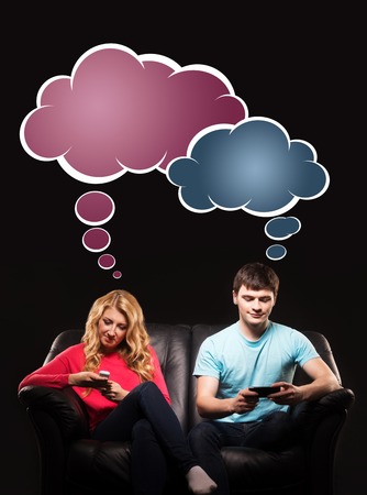 Young couple having disinterest in talking to each other being addicted to social networks. Comics concept.の写真素材