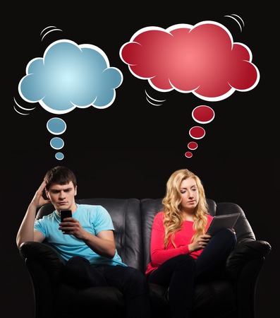 Young couple having disinterest being absorbed by tablet and smartphone. Comics concept.の写真素材