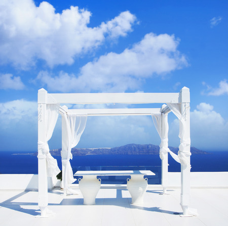 Wedding tent on Santorini island. Beautiful sky and horizon.の写真素材