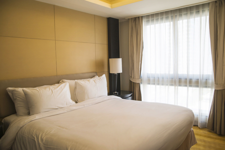 Luxury, modern hotel room cleaned and ready for check-in.の写真素材