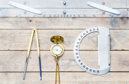 Navigation still-life. Skipper equipment, compass, ruler and protractor. Sailing concept.の写真素材