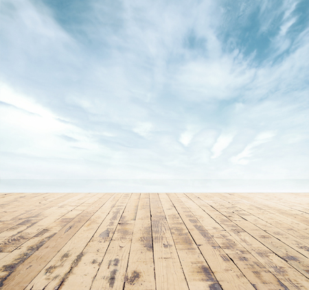Wooden pier, exotic sea and a blue sky. Beautiful summer background. Vacation and traveling concept.の写真素材
