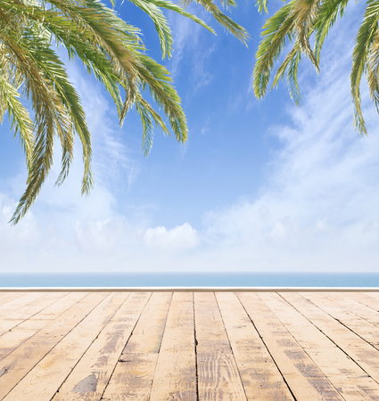 Wooden pier, exotic sea and the blue sky. Beautiful summer background. Vacation and traveling concept.の写真素材