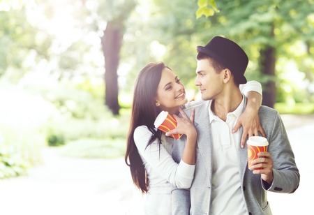 Young handsome man waiting for his girlfriend in the park. Love, relationship, dating: conceptの写真素材