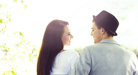 Young beautiful couple having a date in the park. Love, relationship, dating: concept.の写真素材