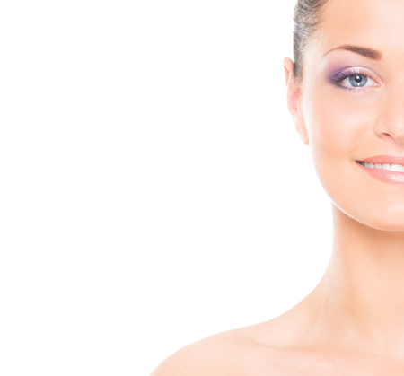Close-up portrait of beautiful, fresh, healthy and sensual girl isolated on whiteの写真素材